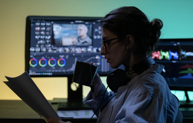 Girl sitting in front of edit suite